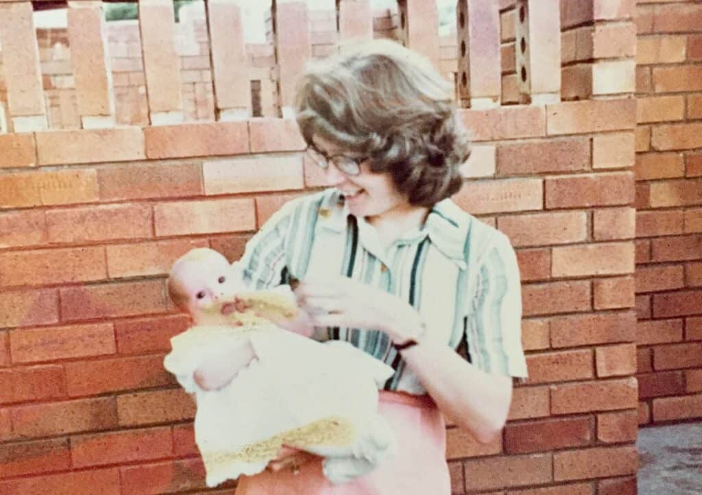 Baby Bianca Johnson with her mother at christening